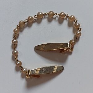 Vintage faux pearl and gold tone sweater clip PAT# 2853761